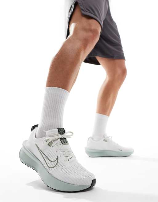 Nike Running Interact Run trainers in light green