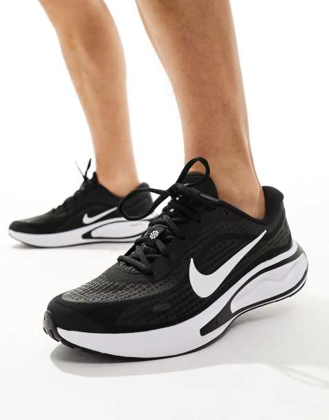 Nike Running Journey Run sneakers in black and white - view 1