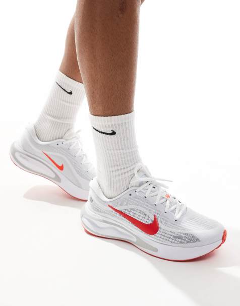 Nike Running Journey Run sneakers in white and red - view 1