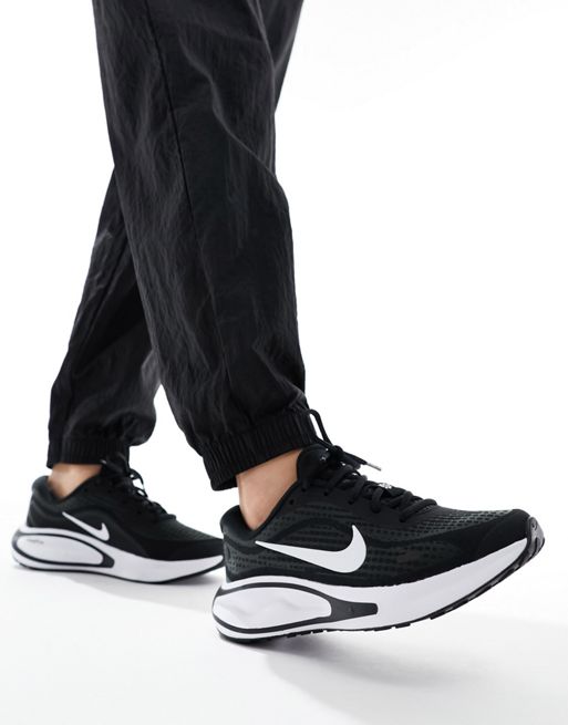 Nike Running Journey Run trainers in black and white