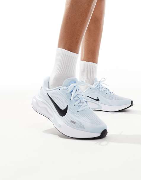 Nike Running Journey Run trainers in blue and white - view 1