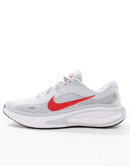 Nike Running Journey Run trainers in grey and red 