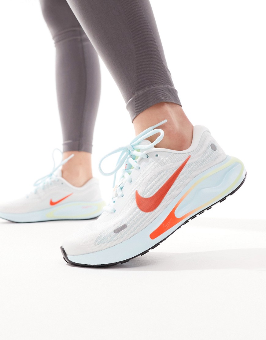 Nike Running Journey Run trainers in white and orange