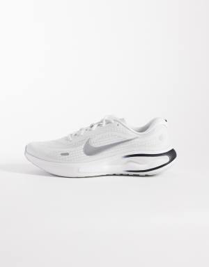 Nike Running Journey Run trainers in white and silver