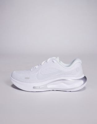 Nike Running Journey Run trainers in white and silver