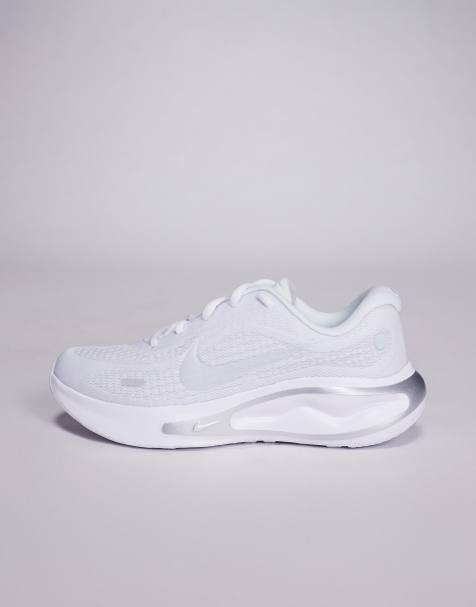 Nike Running Journey Run trainers in white and silver  - view 1