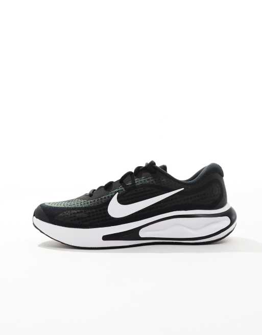 Nike Running Journey trainers in black and white