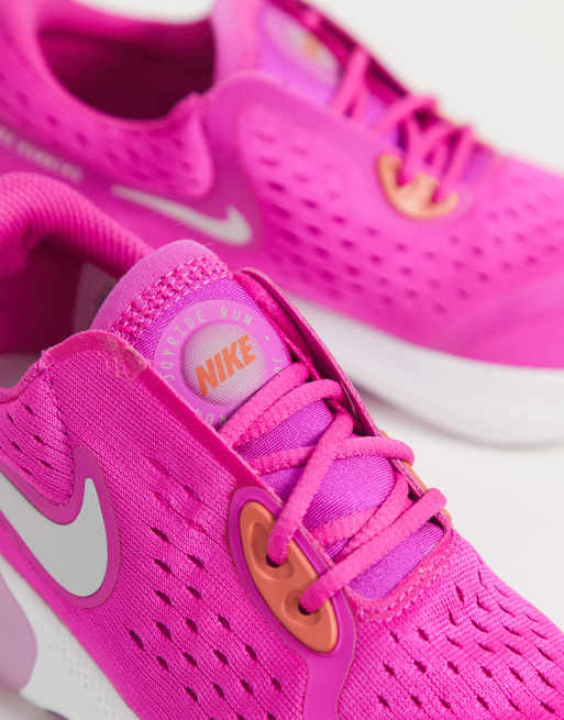 bright nike running trainers