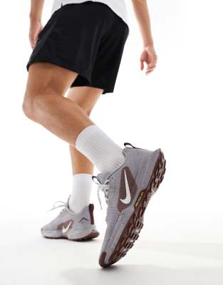 Nike Running Nike Running Juniper Trail 3 trainers in grey and burgundy