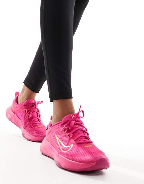 Womens pink deals nike trainers