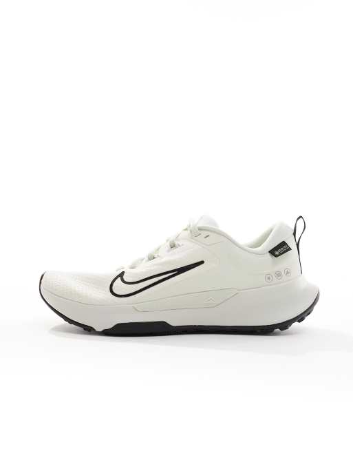 Black and white nike best sale turf shoes