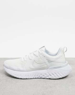 white nike sports trainers