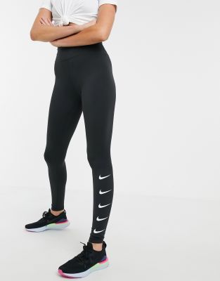 Nike - Leggings avec logo virgule oversize à motif léopard - Noir