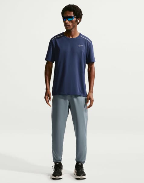 Nike Running Men's Miler Dri-FIT Woven Trousers in Grey - view 1