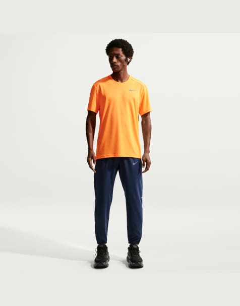 Nike Running Miler Dri-FIT pantalones de tejido para hombre en azul - view 1