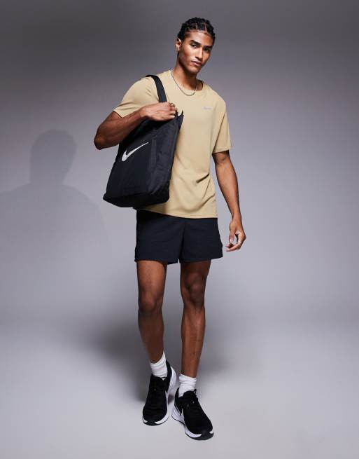 Nike Running Miler Dri-FIT T-shirt in beige