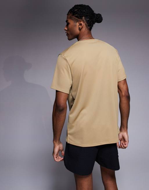 Nike Running Miler Dri-FIT T-shirt in beige