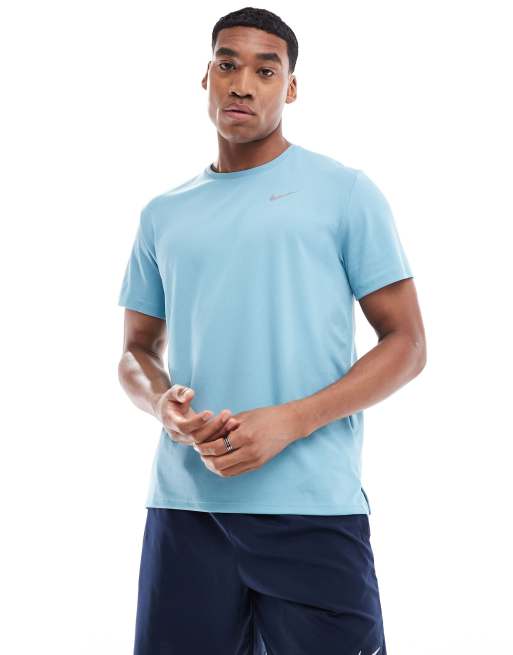 Nike Running Miler Dri FIT t shirt in light blue ASOS