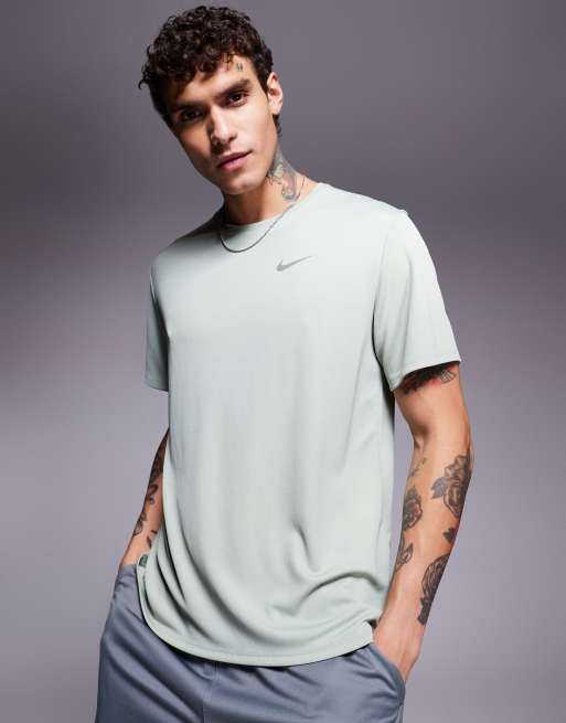 Nike Running Miler Dri FIT T shirt in light green ASOS