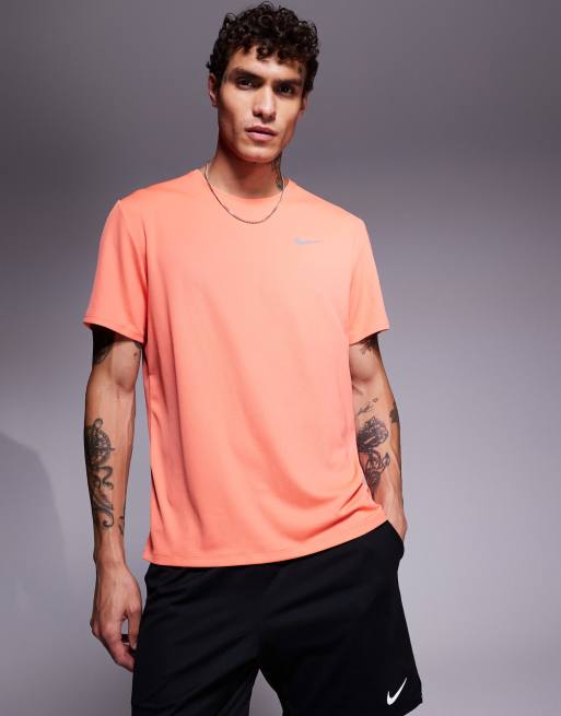 Nike Running Miler Dri FIT t shirt in orange