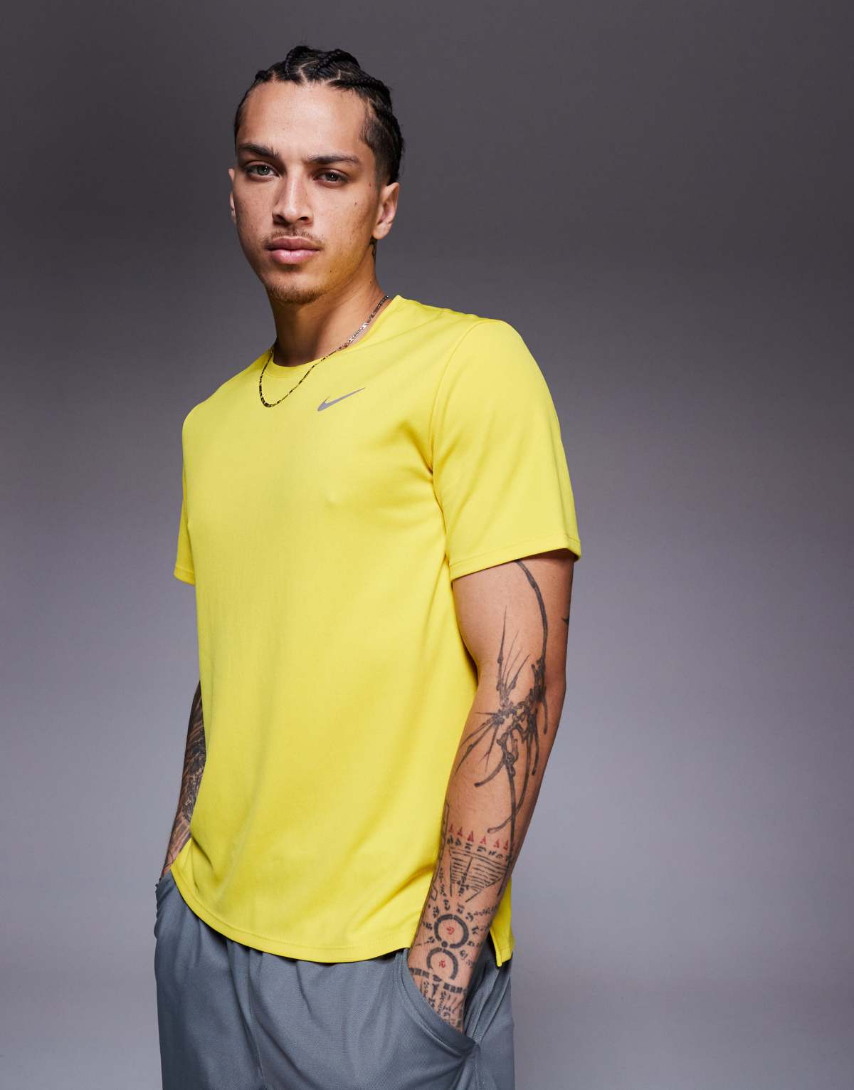 Nike Running Miler Dri-FIT t-shirt in yellow