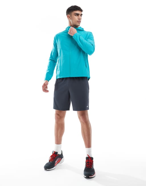 Nike Running Miler jacket in light blue | ASOS