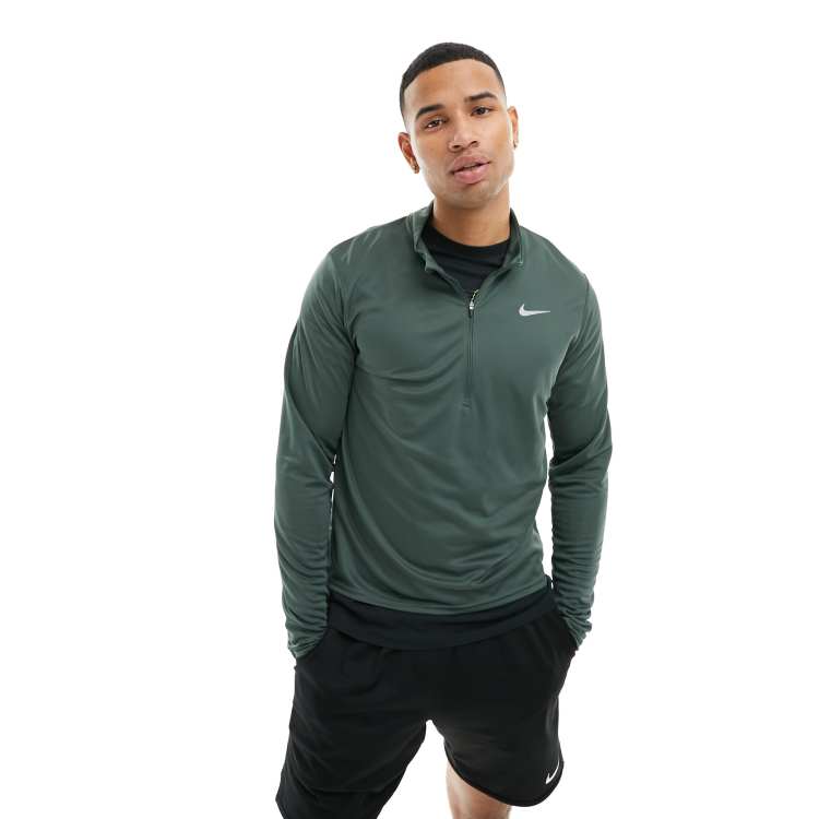 Khaki green nike half zip deals
