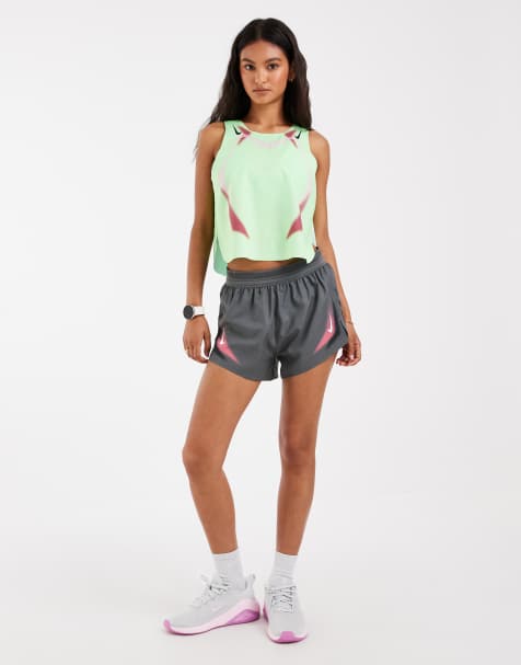 Nike Running pantalones cortos Dri-FIT de talle medio de 3 pulgadas en gris y rosa - view 1