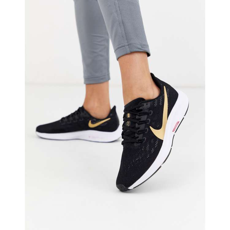 Nike Running pegagus 36 trainers in black gold swoosh | ASOS