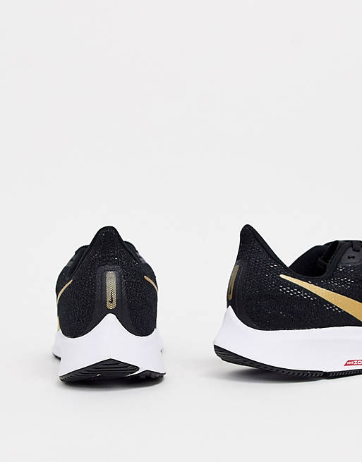 Demonstrate function Stand up instead Nike Running pegagus 36 trainers in black with gold swoosh | ASOS