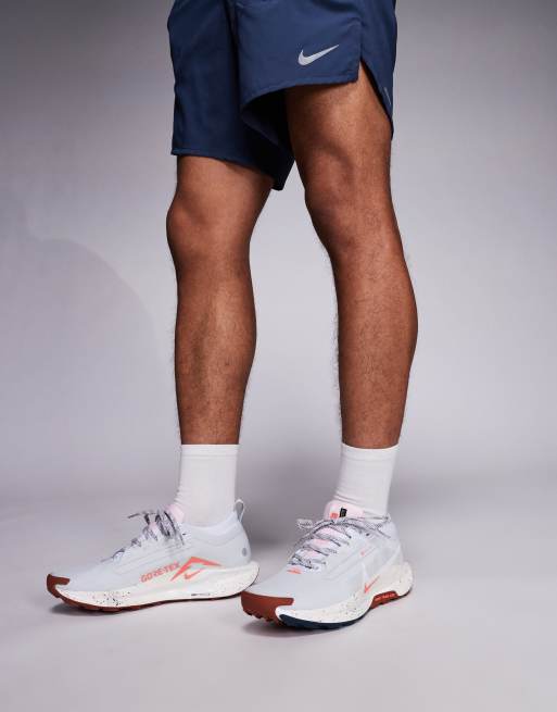 Nike Running Pegasus Trail 5 GORE-TEX sneakers in white and orange