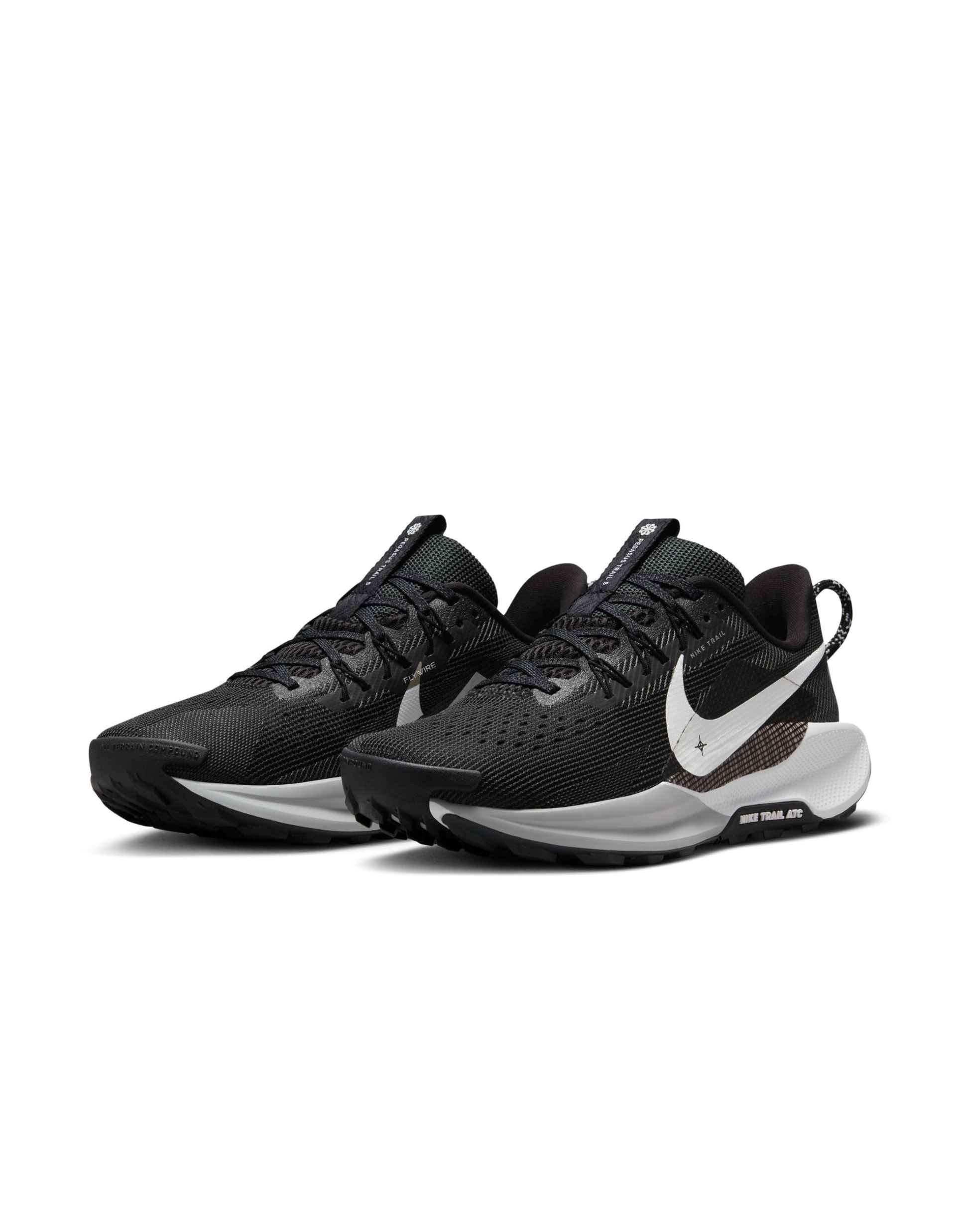 nike running pegasus trail 5 sneakers in black and white