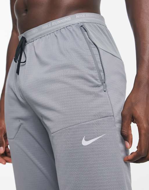 Nike Running Run Division Phenom Elite Flash reflective joggers in