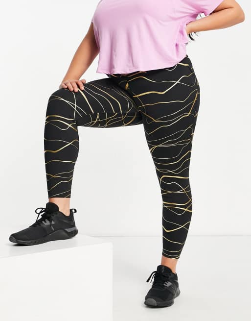 Nike Running Icon Clash Fast Tight leggings in black and gold