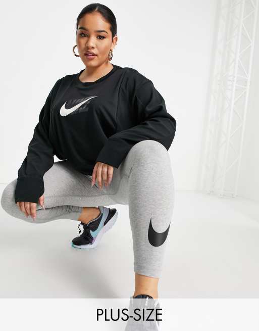 Nike Running Plus Icon Clash midlayer top in black | ASOS