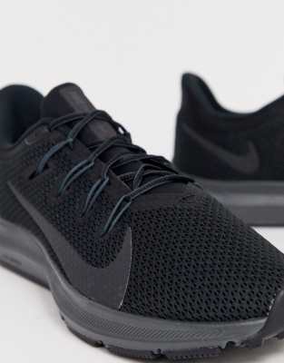 all black nike running shoe