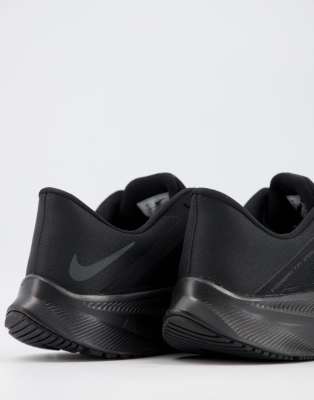 nike running quest 3 sneakers in triple black