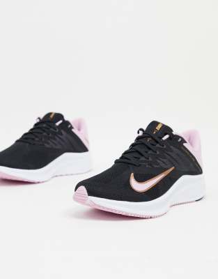 black and pink trainers