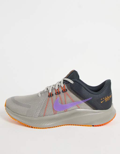 Nike running quest trainers best sale in grey