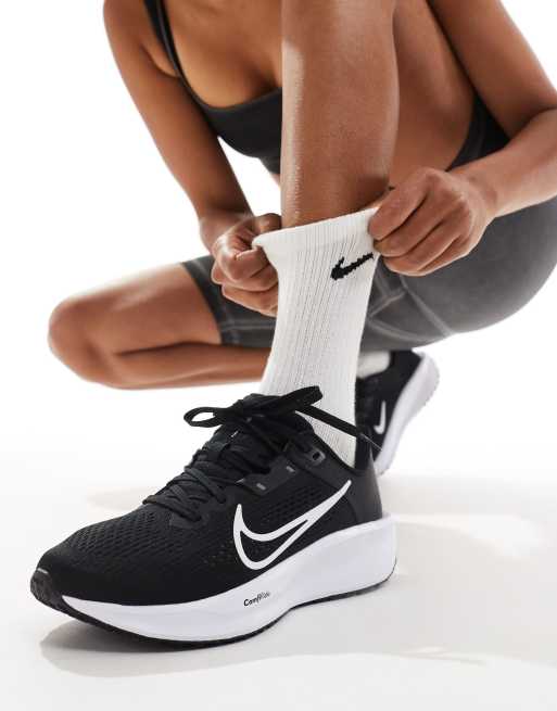 Nike Running Quest 6 sneakers in black and white