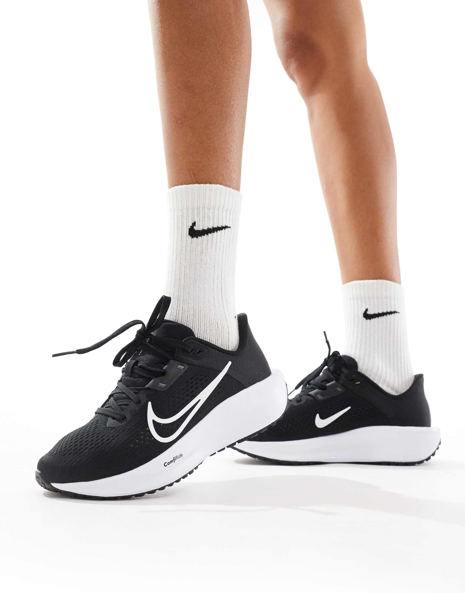 nike running quest 6 sneakers in black and white