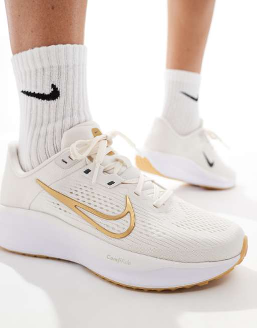 Nike womens running shoes white and gold online