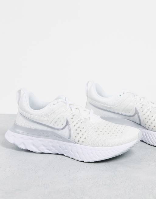 Nike Running React Infinity Run Flyknit 2 sneakers in white/metallic ...