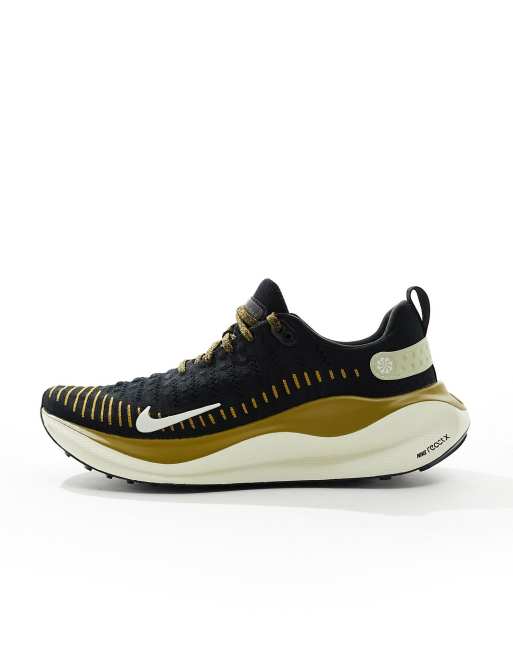 Nike Running React infinity Run Flyknit 4 trainers in black and gold