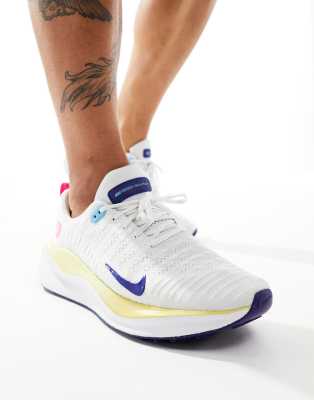 Nike Running Nike Running React infinity Run Flyknit 4 trainers in white and gold