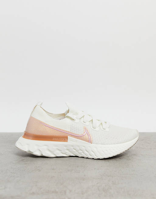  Trainers/Nike Running React Infinity Run Flyknit trainers in ivory and pink 
