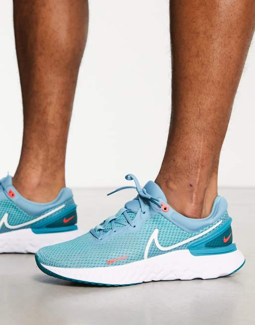 Blue nike running store trainers