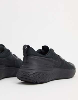 nike running react miler trainers in triple black