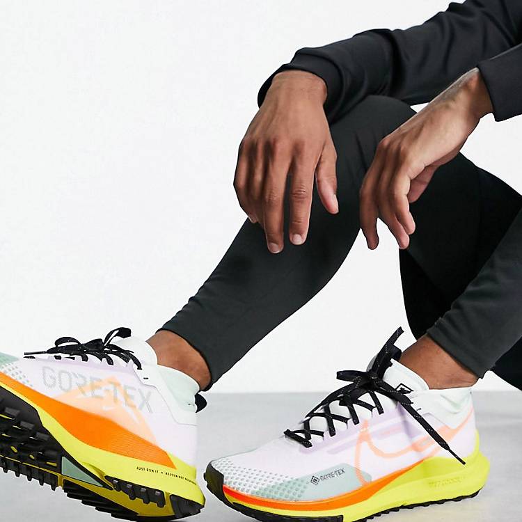 allowance to add Savant Nike Running React Pegasus Trail 4 GORE-TEX sneakers in white and yellow |  ASOS