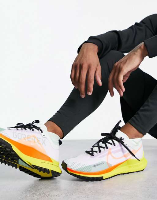 Ver weg Buiten zoet Nike Running React Pegasus Trail 4 GORE-TEX sneakers in white and yellow |  ASOS